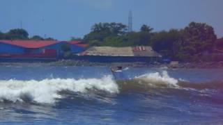 Surfing and SUP Boarding Corinto Nicaragua [upl. by Valerye740]