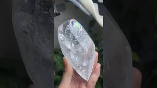 Clear crystal with natural crack and bubble insiderefracting colorful light under translucent light [upl. by Remark398]