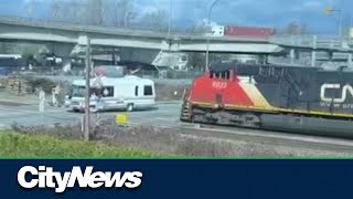 Train hits RV stalled on tracks in Langley [upl. by Einal]