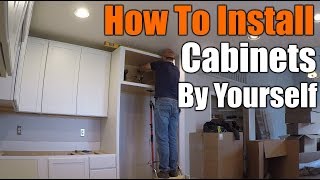 How To Install Upper Kitchen Cabinets By Yourself  THE HANDYMAN [upl. by Nitsirhc]