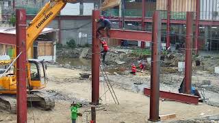 Installing the cross beam Agdao Farmers Market Philippines [upl. by Eylsel989]