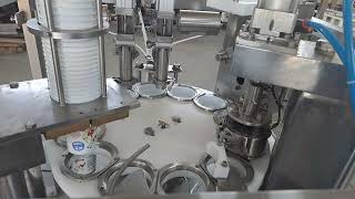 Yoghurt packing filling and sealing machineMasina za pakuvanje kiselo mleko [upl. by Aikaj514]