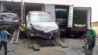 Scary Way They Unload Imported Broken Cars in Nigeria [upl. by Anaugahs]