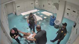 RAW Video shows jailers hit pepper spray restrained woman [upl. by Merell852]