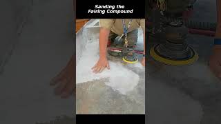 Sanding the Fairing Compound shorts boatprojects boatbuilders plywoodboat boatbuilding [upl. by Olracnaig]