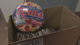 Business owner donates 200 frozen pizzas to Rockford Rescue Mission [upl. by Angelle488]