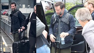 Keanu Reeves 59 looks youthful in a blue denim jacket as he arrives at the Manchester airport for [upl. by Diann]