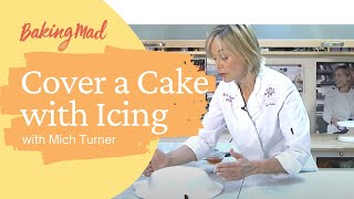 How to Cover a Cake With Ready to Roll Icing  Baking Mad [upl. by Carlen993]