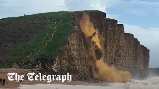 Dorset cliff collapses launching 400tonnes of rockfall into ocean [upl. by Ahsoj879]