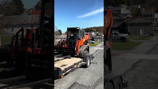 Unloading skid loader [upl. by Bolan]