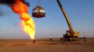 Putting Out a Well Fire With a Crane Caping Device [upl. by Brouwer899]