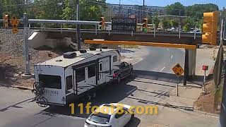 Camper trailer loses equipment at the 11foot88 bridge [upl. by Eberly743]