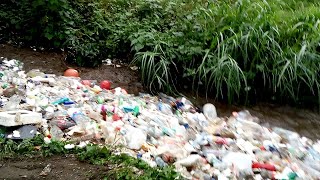 A River of Plastic Waste in Guatemala  ViralHog [upl. by Aillicsirp]