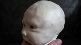 sculpting a clay baby head by Phils Clay Babies better known as Philsooakbabies [upl. by Graces]