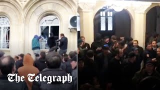 AntiRussia protesters storm parliament in Georgian breakaway region of Abkhazian [upl. by Stan]