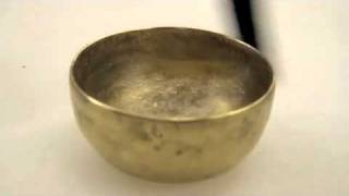 Tibetan singing bowl filled with liquid [upl. by Eceined]