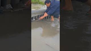 Unclogged water culvert drain by garbage shorts cleaning plastic unclog [upl. by Akilaz480]