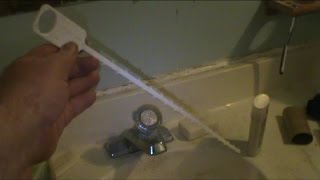 Unclogging my bathroom sink with a mini snake barbed drain unclogger [upl. by Eznyl]