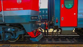 Decoupling diesel locomotive TEP700537 from the passenger train at the Ussuriysk station Russia [upl. by Glad161]