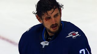 Jets Hellebuyck cut open after Morrisseys stick accidentally clips him [upl. by Zela]