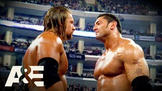 Batista BETRAYS Triple H Leading to EPIC Rivalry  WWE Rivals  AampE [upl. by Rolph]