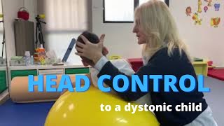 Facilitating head control to a dystonic quadriplegic child with cerebral palsy NDT intervention [upl. by Collier]