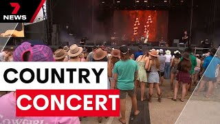 Music fans rock on at Australias biggest country festival  7 News Australia [upl. by Eartha]