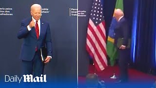 Joe Biden awkwardly stumbles into pole and doesnt shake President Lulas hand [upl. by Bonne423]