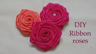 Diy ribbon roses ribbon rosettes tutorial how to makeflores de cinta [upl. by Ailaro]