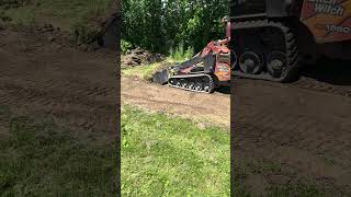 Ditch Witch SK1550 removing sod [upl. by Ruon]