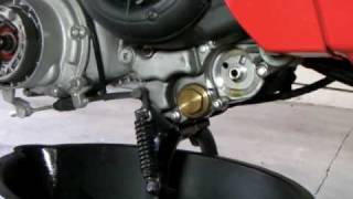 Vespa LX 150 Engine Oil Change How to [upl. by Aicened]