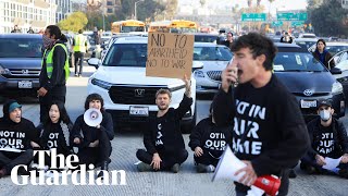 Dozens of activists block Los Angeles highway calling for Gaza ceasefire [upl. by Eugilegna854]