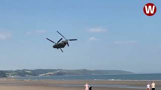 Moment lowflying Chinook helicopter thunders over Welsh beach [upl. by Faludi83]