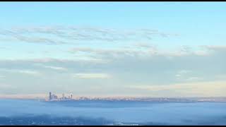 Timelapse clouds over Seattle set to recorder music [upl. by Ahsiekam370]