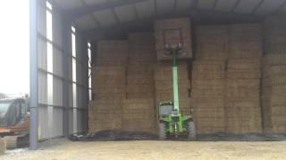 Merlo stacking bales [upl. by Litnahc]