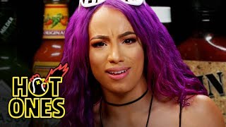 Sasha Banks Bosses Up While Eating Spicy Wings  Hot Ones [upl. by Doomham]