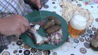 The traditional Swedish way to eat surströmming [upl. by Peti]