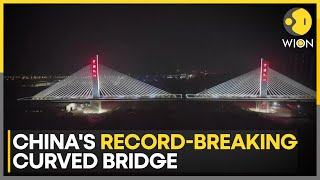 World’s Largest Asymmetrical Curved Bridge Completed In China  Latest News  WION [upl. by Hannis]