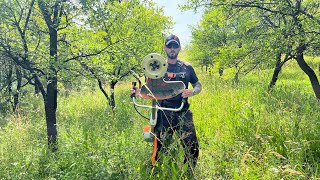 Stihl Fs 560C with durocut 404 trimmer head cutting big grass [upl. by Yatnahc668]