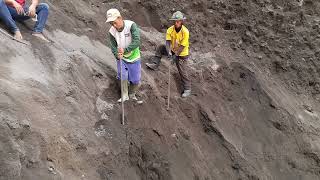 this guy helped the miners drop the sand and load it into the truck but he slipped [upl. by Ifar743]