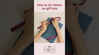 How to tie diagonal ribbon bow on gift box shorts giftwrappingideas ribbonbow [upl. by Rivi]