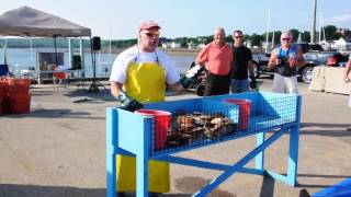 Scallop Shucking Demonstration at Digby Scallop Days [upl. by Atteugram542]