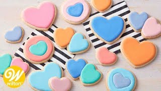 How to Make Thinned Royal Icing For Cookie Decorating  Wilton [upl. by Nairb]