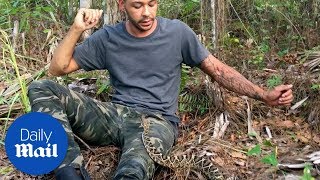 Man tries to escape being bitten by a rattlesnake [upl. by Amoritta]