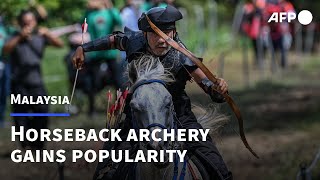 Horseback archery Malaysians take a shot at ancient pastime  AFP [upl. by Ordnasela]