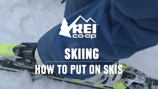 How to Put on Skis  REI [upl. by Pages]