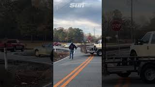 Driver flees car seconds before train smashes into it [upl. by Nannaihr]