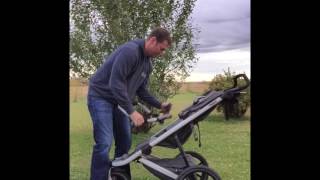 Installing Thule Infant Car Seat Adapter for Urban Glide [upl. by Akinoj]