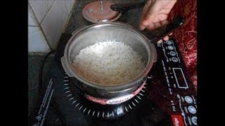 Making rice directly in 15L VINOD Pressure cooker on Induction cooktop [upl. by Neeoma]