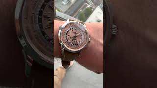 Patek Philippe Complications World Time Flyback Chronograph 5935A  SwissWatchExpo [upl. by Ahsenhoj]